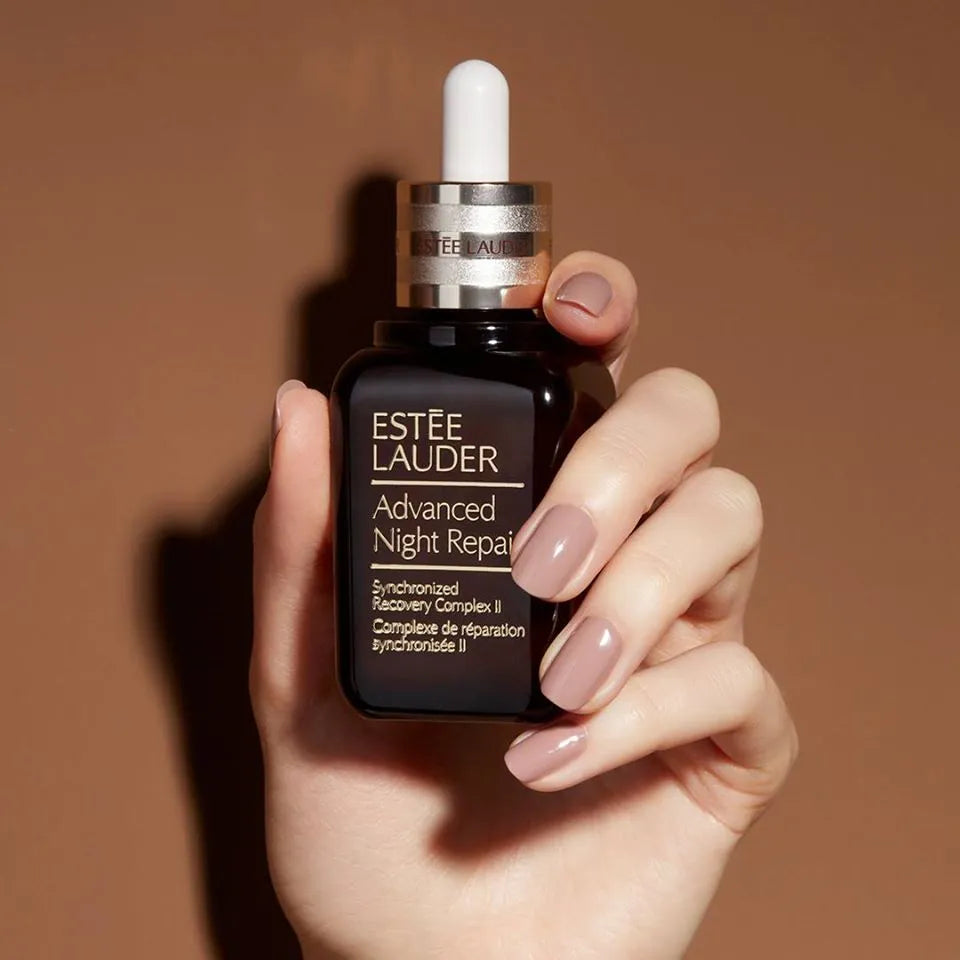 Bottle of ESTEE LAUDER Advanced Night Repair serum for anti-aging and skin renewal