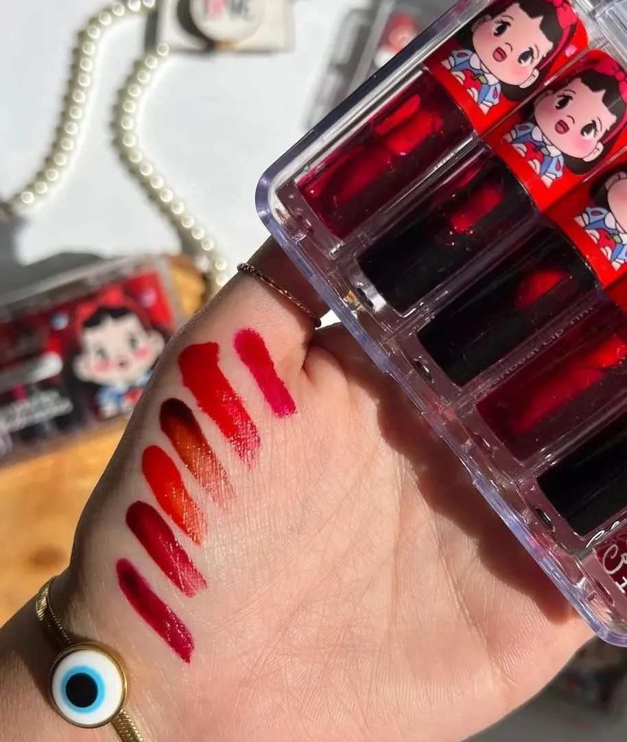 Color Castle Heartbeat Sensation liquid lipstick in vibrant red matte shade with applicator wand