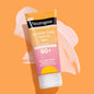 Neutrogena Invisible Daily Defense SPF 60+ sunscreen lotion bottle with broad spectrum protection and hydrating formula