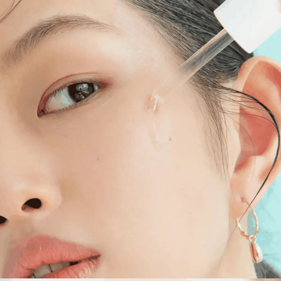 AXIS-Y Advanced Aqua Boosting Ampoule bottle with hydrating skincare elements and water droplets