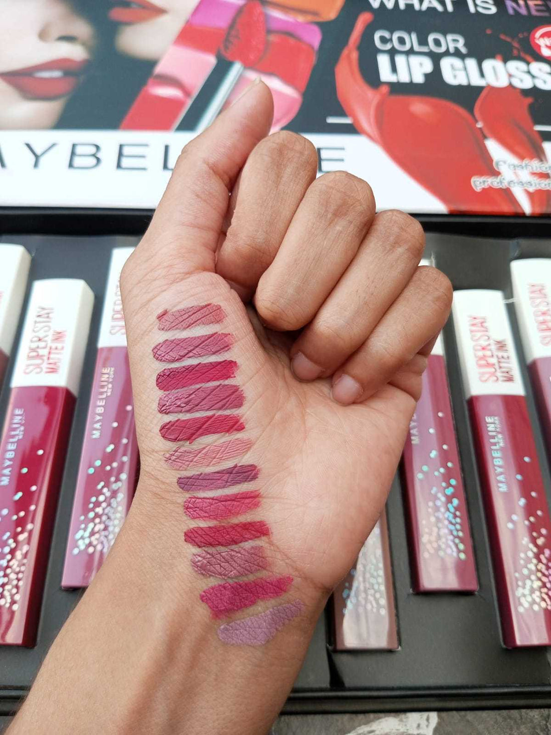 Maybelline New York Believe 12 PCS Color Matte Lip Gloss collection with 12 vibrant shades and smooth matte finish